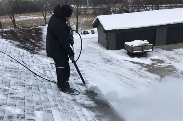 Ice Dam Removal: Protecting Your Roof & Preventing Water Damage