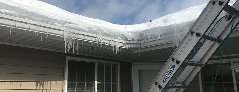 Build up of ice in gutters on a home